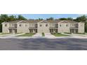 Charming townhome showcases a well-manicured lawn, inviting entrance, and private garage, creating curb appeal at 3647 Copper Beech Drive Loop, Land O Lakes, FL 34638