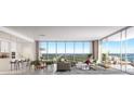 Spacious open-concept living and dining area with floor-to-ceiling windows and stunning views at 235 1St S Ave # 2502, St Petersburg, FL 33701