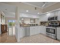Bright kitchen boasting stainless steel appliances, granite countertops, and an adjacent breakfast area at 6450 Shoreline Dr Dr # 9202, St Petersburg, FL 33708