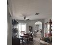Open dining area with a view of the outdoor space and stylish decor, perfect for Gathering gatherings at 4217 Balington Dr, Valrico, FL 33596