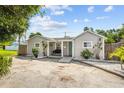 Single-story home features a quaint front porch and low maintenance landscaping at 5315 40Th N St, St Petersburg, FL 33714