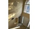 Bright foyer features high ceilings, neutral walls, and decorative niche at 1209 Alhambra Crest Dr, Ruskin, FL 33570