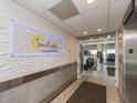 The elegant lobby of Sand Castle welcomes you with a stylish sign and convenient access to parking at 20002 Gulf Blvd # 2803, Indian Shores, FL 33785
