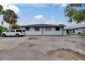 The exterior view of this single story home offers ample parking and a well maintained facade at 1049 Apollo Beach Blvd # D, Apollo Beach, FL 33572