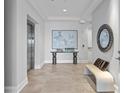 Elegant lobby with seating, artwork, and elevator at 44 Bayview S Ct # A, St Petersburg, FL 33711