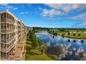 Aerial view of condo building overlooking golf course at 1200 Country Club Dr # 6103, Largo, FL 33771
