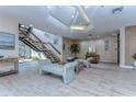 Elegant lobby with seating area and staircase at 6322 Palma Del Mar S Blvd # 505, St Petersburg, FL 33715