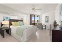 Primary bedroom with water views at 5940 Pelican Bay S Plz # 1204, Gulfport, FL 33707