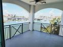 Spacious balcony offering stunning waterfront views and a relaxing atmosphere at 211 Dolphin Pt # 302, Clearwater, FL 33767