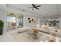 Bright and airy living room with marble flooring, open floor plan and water views at 211 Dolphin Pt # 302, Clearwater, FL 33767