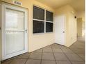Residential building entrance with private door at 960 Starkey Rd # 2303, Largo, FL 33771