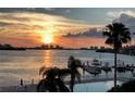 Stunning sunset over the water, marina, and city skyline at 100 Pierce St # 307, Clearwater, FL 33756