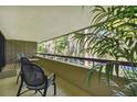 Balcony with wooded view and outdoor seating at 36750 Us Highway 19 N # 04239, Palm Harbor, FL 34684