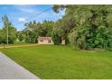 Ranch style home with a spacious yard and mature trees at 33466 Westwood Dr Dr, Ridge Manor, FL 33523