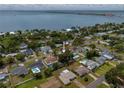 Property view showcasing location near the water, neighborhood, and backyard at 2441 69Th S Ave, St Petersburg, FL 33712