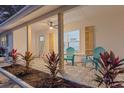 Inviting front porch with stylish tile and comfortable seating at 375 Roosevelt Ave, Brooksville, FL 34604