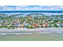 Aerial view of waterfront home in a coastal community at 16110 3Rd E St, Redington Beach, FL 33708