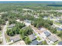 Sprawling neighborhood, a blend of established homes and new construction surrounded by trees at 4780 Majestic Hills Loop, Brooksville, FL 34601