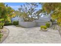 Elegant home with a large driveway and beautifully landscaped grounds at 1761 Oceanview Dr, St Petersburg, FL 33715
