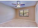 Bright bedroom with carpeted floor and ceiling fan at 2020 Lakeview Dr # 203, Clearwater, FL 33763