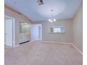 Dining room with wet bar and access to kitchen at 2020 Lakeview Dr # 203, Clearwater, FL 33763