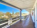 Exterior hallway with tiled floor and view of grassy area at 6015 19Th N St # 308, St Petersburg, FL 33714