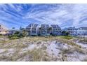 Beachfront view of condo complex at 19930 Gulf Blvd # 1A, Indian Shores, FL 33785