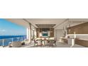 Open concept dining area with water views and modern kitchen at 5701 Bowen Daniel Dr. # 1701, Tampa, FL 33616