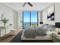 Bright bedroom with water views, plush bedding, and modern decor at 1 Beach Se Dr # 1604, St Petersburg, FL 33701