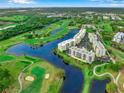 Aerial view of community near golf course and lake at 1200 Country Club Dr # 2106, Largo, FL 33771