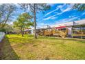 Community of townhouses with private decks and grassy backyard at 6264 92Nd Pl N # 3104, Pinellas Park, FL 33782