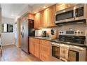 Well-equipped kitchen with stainless steel appliances, granite counters, and ample cabinet space at 821 Bahia Del Sol Dr # 43, Ruskin, FL 33570