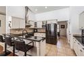 Modern kitchen with stainless steel appliances and granite countertops at 1729 Oakwood Estates Dr, Plant City, FL 33563