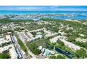 Aerial view of waterfront community with pool at 14130 Rosemary Ln # 4104, Largo, FL 33774