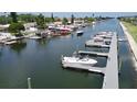 View of calm waterway with boats and marina from condo at 5157 Silent Loop # 302, New Port Richey, FL 34652