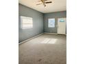 Spacious living room with gray walls and carpet at 2907 N 17Th St, Tampa, FL 33605