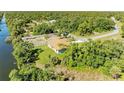 Aerial view of a single-Gathering home near a waterway at 756 Bowman Ter, Port Charlotte, FL 33953