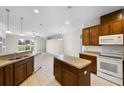 Kitchen with island and stainless steel appliances at 2622 Yukon Cliff Dr, Ruskin, FL 33570