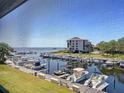 Breathtaking view of marina, boats and water at 1801 Mariner Dr # 20, Tarpon Springs, FL 34689