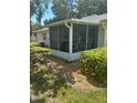 Relaxing screened-in patio featuring outdoor seating and a peaceful setting at 3357 38Th S St # A, St Petersburg, FL 33711