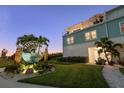 Home exterior at dusk, near Dunedin Causeway at 232 Causeway Blvd, Dunedin, FL 34698