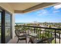 Spacious balcony with ocean views and patio furniture at 4510 Gulf Blvd # 508, St Pete Beach, FL 33706
