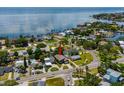 An aerial view of a waterfront property in a quiet residential neighborhood at 3425 Overlook Ne Dr, St Petersburg, FL 33703