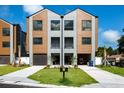 Modern two-story home with attached garage and landscaping at 2214 Bay Blvd # A, Indian Rocks Beach, FL 33785