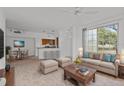 Open concept living room, kitchen, and dining area at 10590 Windsor Lake Ct # 0, Tampa, FL 33626