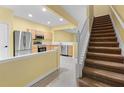 Kitchen with stainless steel appliances and a half-wall at 2619 Redford Way, Wesley Chapel, FL 33544