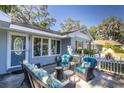 Relaxing patio area with wicker furniture at 5523 Carlton Rd, New Port Richey, FL 34652