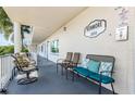 Community patio with seating and lush greenery at 2850 59Th S St # 204, Gulfport, FL 33707