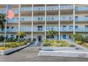 Building exterior showcasing the main entrance and landscaping at 2850 59Th S St # 204, Gulfport, FL 33707
