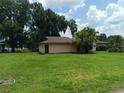 Single story home with large yard at 3754 Lake Joyce Dr, Land O Lakes, FL 34639